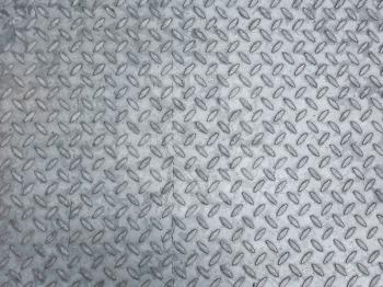 Grey steel diamond plate useful as a background