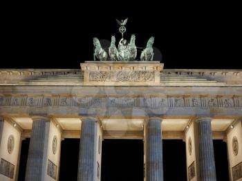 Brandenburger Tor meaning Brandenburg Gate in Berlin, Germany at night