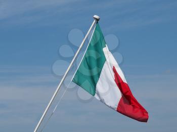 the Italian national flag of Italy, Europe over blue sky