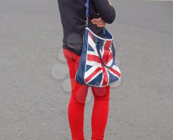 Girl with bag with the Union Jack national flag of the United Kingdom (UK)