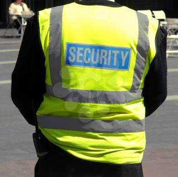 A detail of a security staff member
