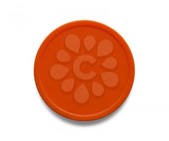 Orange plastic chip fiche token money used to buy food and drink during event or festival - over white with soft shadow