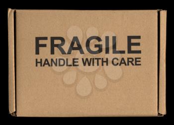 Fragile handle with care warning sign label tag on a cardboard box