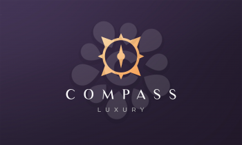 simple compass logo concept in a modern and luxury style with gold color