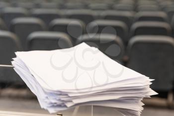 A4 paper documents in the event hall