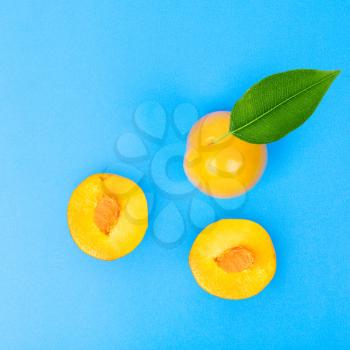 Yellow plum fruit on the white background isolated