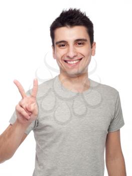 Royalty Free Photo of a Man Giving a Peace Sign