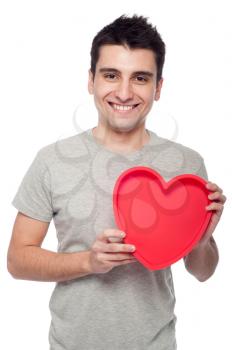 Royalty Free Clipart Image of a Man Holding a Heart