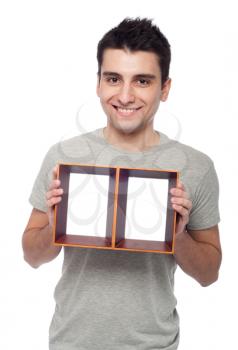 Royalty Free Photo of a Man Holding a Frame