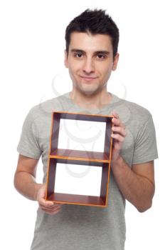 Royalty Free Photo of a Man Holding a Frame