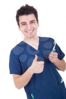 Royalty Free Photo of a Dentist Holding a Toothbrush