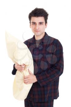Royalty Free Photo of a Man in Pajamas Holding a Pillow
