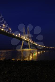 Royalty Free Photo of a Night Shoot of Vasco da Gama Bridge in Lisbon, Portugal