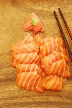 Royalty Free Photo of Sashimi With Chopsticks 