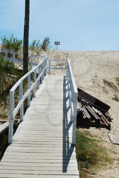 Royalty Free Photo of a Boardwalk at the Beach
