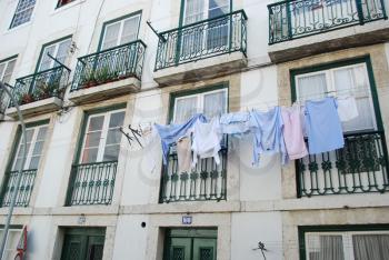 Royalty Free Photo of Clothes Drying Outside a Building