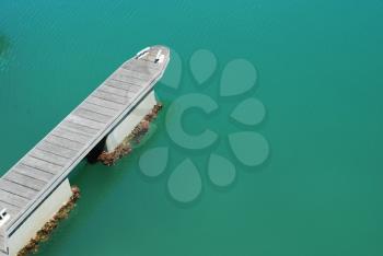 Royalty Free Photo of a Green Water Dock
