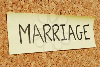 Royalty Free Photo of the Word Marriage on a Bulletin Board
