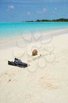 Royalty Free Photo of a Maldives Note Written on a Beach