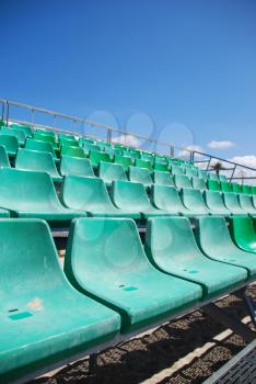 Royalty Free Photo of Green Stadium Bleachers on the Beach