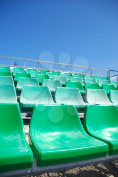 Royalty Free Photo of Green Stadium Bleachers on the Beach