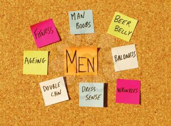 Royalty Free Photo of Male Issues on a Cork Board