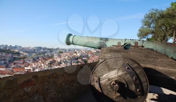 Royalty Free Photo of an Iron Cannon Protecting the Capital of Portugal, Lisbon