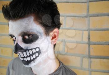 Royalty Free Photo of a Man With His Face Painted 