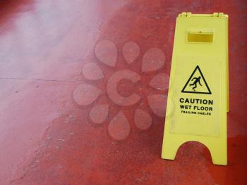 Royalty Free Photo of a Yellow Caution Wet Floor Sign