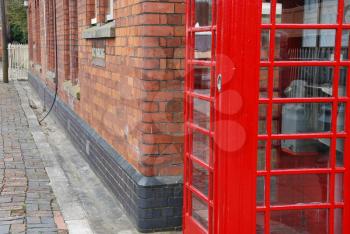 Royalty Free Photo of a Red Telephone Booth 