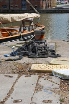 Royalty Free Photo of a Bollard and Mooring Ropes at Gloucester Docks, England