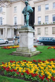 Royalty Free Photo of an Edward Adrian Wilson Statue in a Garden in Cheltenham