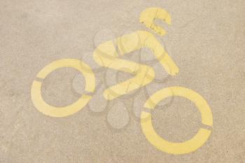 Royalty Free Photo of a Motorcycle Sign Painted on Pavement