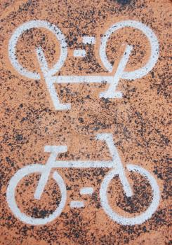 Royalty Free Photo of Bicycle Road Signs on Asphalt