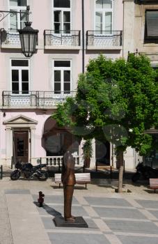 Royalty Free Photo of the Fernando Pessoa Statue in So Carlos Square in Lisbon, Portugal