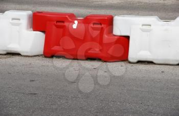 Royalty Free Photo of White and Red Water Road Construction Barriers