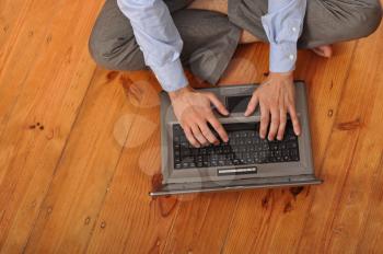 Royalty Free Photo of a Man on a Laptop