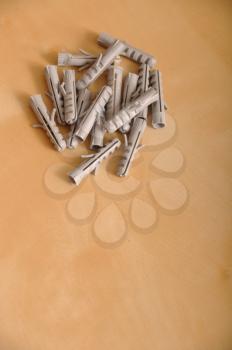 Royalty Free Photo of a Pile of Plastic Dowels