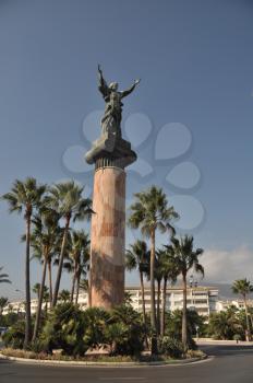 Royalty Free Photo of La Victoria Statue in Puerto Banus, Spain