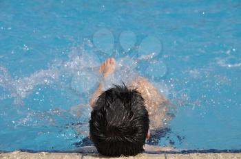 Royalty Free Photo of a Man Doing Water Gymnastics