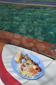 Royalty Free Photo of a Meal on a Boat