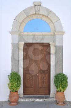 Royalty Free Photo of the Entrance of a Greek Church in Zia Village, Greece