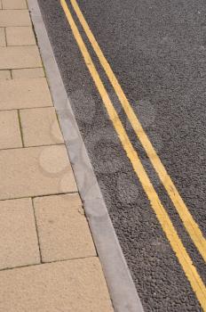 Royalty Free Photo of Double Yellow Lines on the Asphalt Road