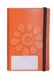 Royalty Free Photo of an Orange Notebook