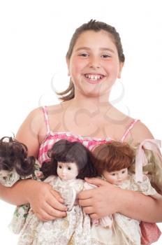 Royalty Free Photo of a Girl Holding Her Dolls