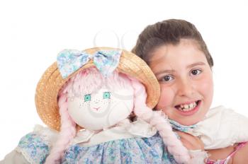 Royalty Free Photo of a Little Girl Holding a Doll