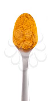 Royalty Free Photo of a Spoonful of Turmeric