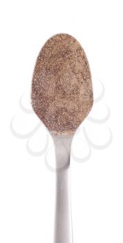 Royalty Free Photo of a Spoonful of Black Pepper