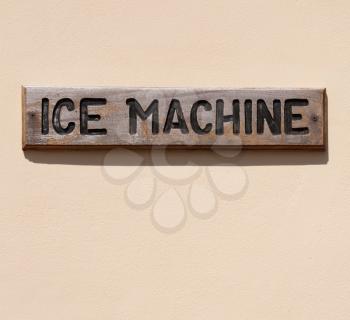 Royalty Free Photo of a Wooden Ice Machine Sign