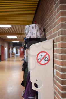 A no bicycle sign on students coat rack